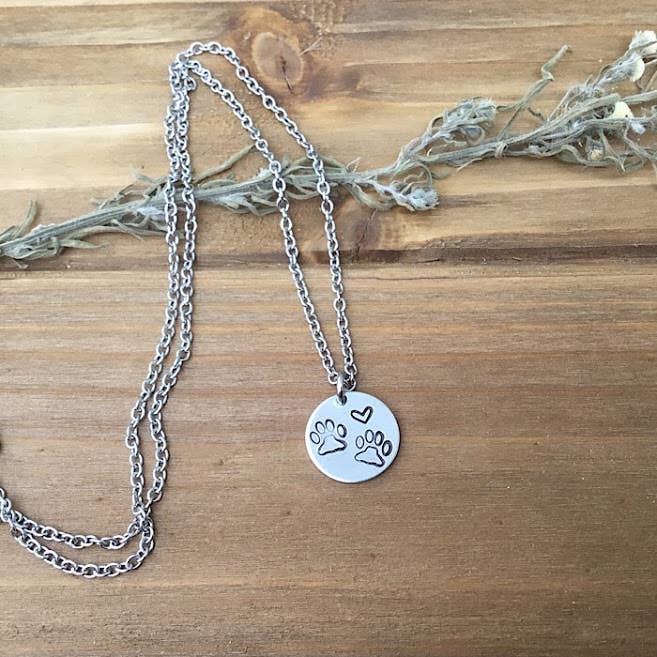 Dogs are Miracles with Paws Pendant Necklace on a silver chain with a top layer of sterling silver